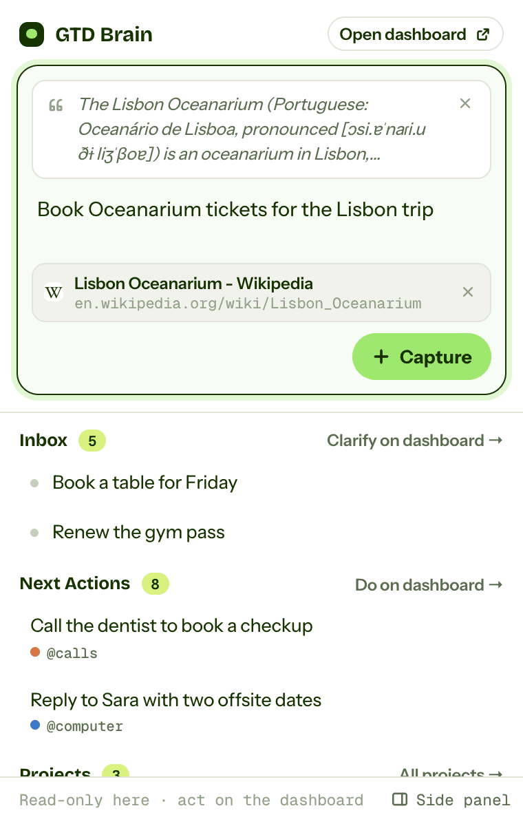 The GTD Brain extension popup with a quote from the Lisbon Oceanarium Wikipedia page, the typed capture Book Oceanarium tickets for the Lisbon trip, the page attached as a link, and the Inbox, Next Actions and Projects below