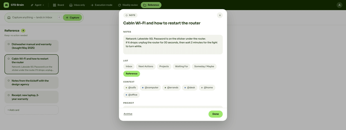 The Reference view in GTD Brain with four cards, and the card Cabin Wi-Fi and how to restart the router open, its notes saying where the password is and how to restart the router