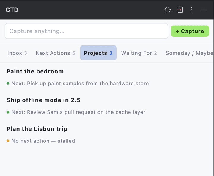 The Projects tab listing Paint the bedroom and Ship offline mode in 2.5 with their next actions, and Plan the Lisbon trip marked No next action, stalled