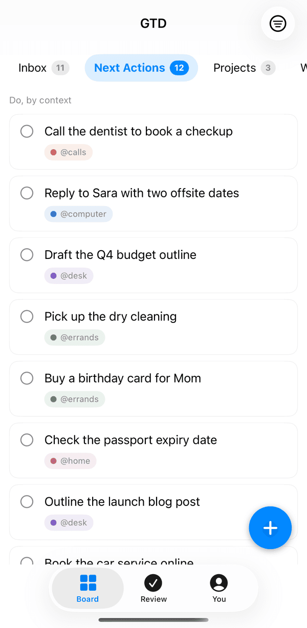 The GTD Brain iPhone app on the Next Actions tab: Call the dentist to book a checkup tagged @calls, Reply to Sara with two offsite dates tagged @computer, Pick up the dry cleaning tagged @errands