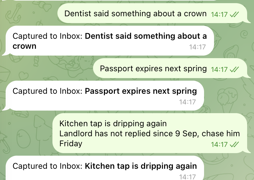 The GTD Brain bot in Telegram confirming three captures: each message sent to the bot is answered with Captured to Inbox and the card title